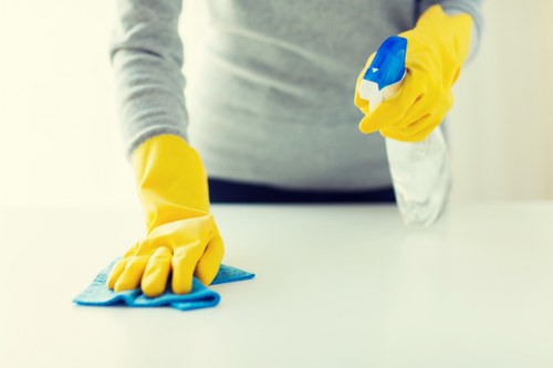 Preparing a room for stain removal service in SE8