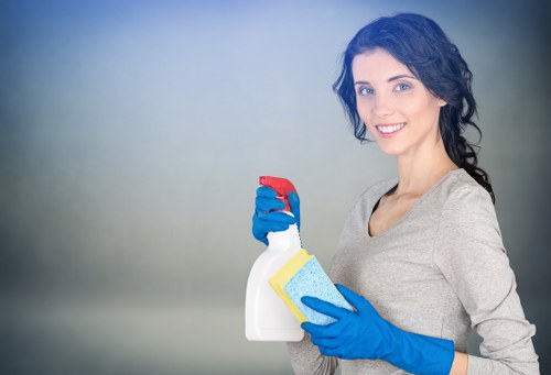 Local cleaner completing an Airbnb turnaround in a modern SE8 apartment